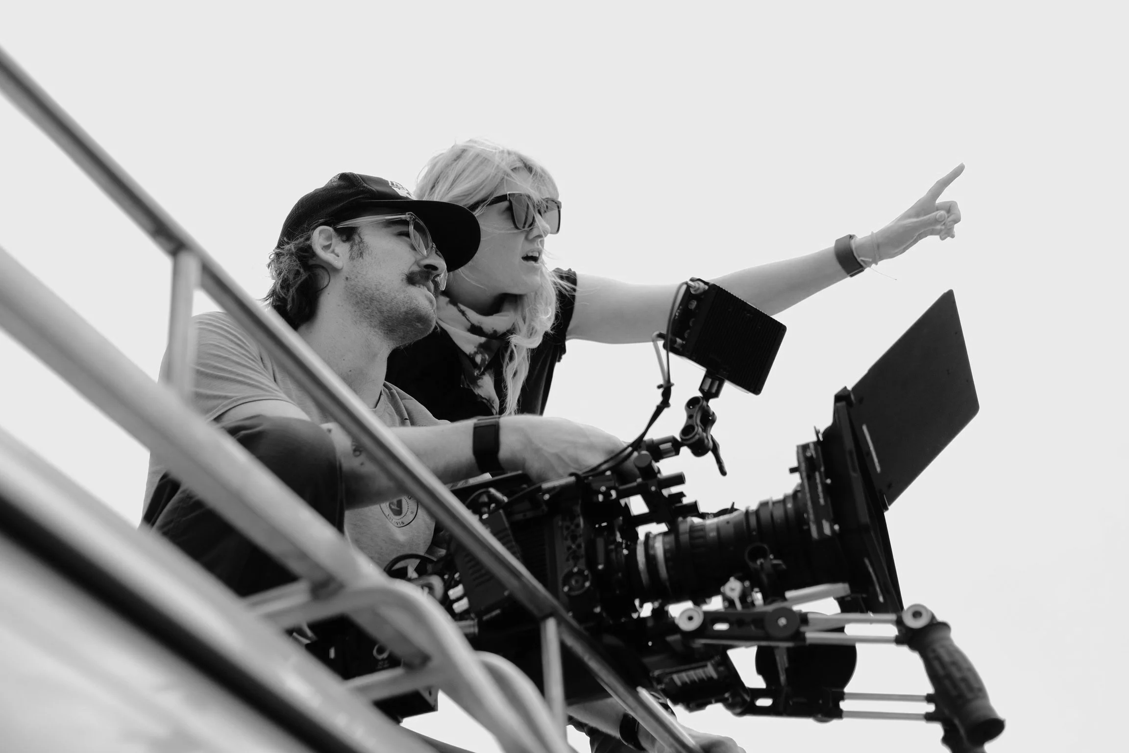 NMC crew setting up a camera rig at night